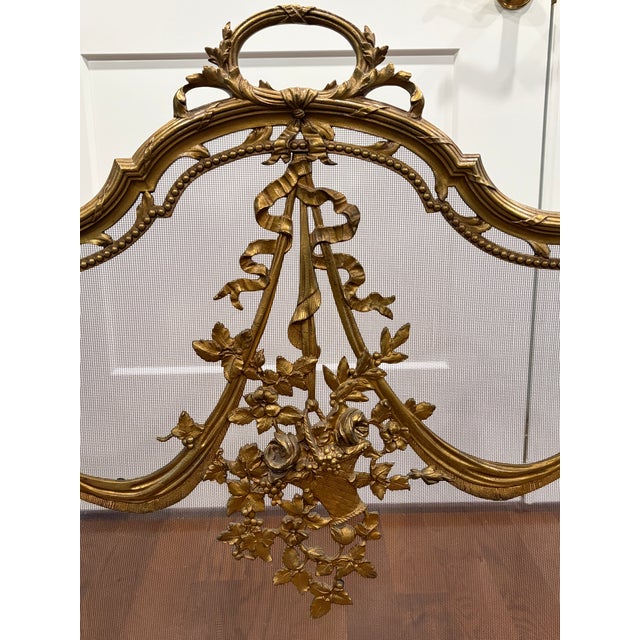 Bring a touch of timeless sophistication to your fireplace with this antique-inspired screen. Made in France around 1960...