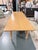 An exceptional example of early 1900s English country-house furniture, this antique pine farmhouse dining table carries...