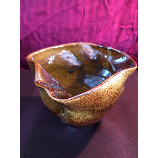 Unique organic design ceramic bowl. Artisan pottery. Exact age and origin unknown.