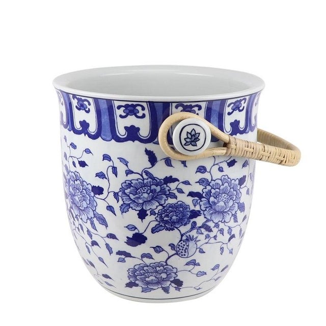 Elevate your entertaining experience with our Blue & White Peony Blossom Ice Bucket. The intricate porcelain design is...