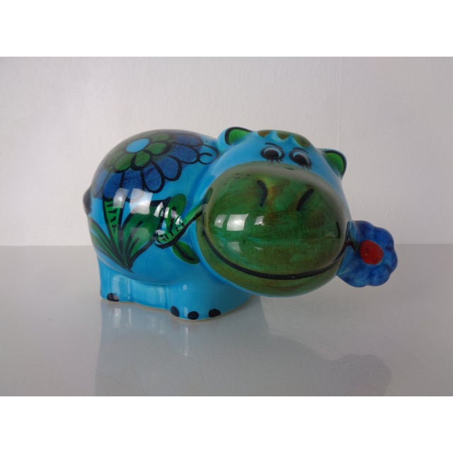 Hand-painted ceramic money box in the shape of a hippopotamus from the 1970s.
