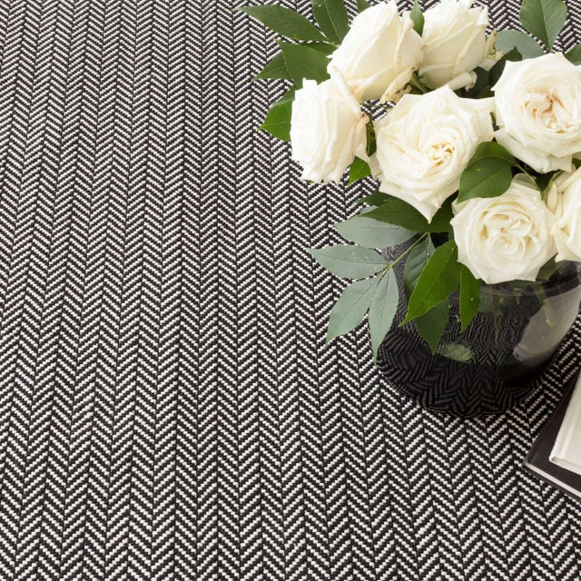 This classic menswear inspired pattern is the perfect way to add a touch of understated elegance to any room in or out of...