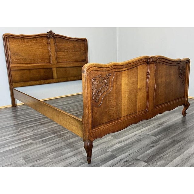 This Vintage French Louis double bed frame showcases elegant proportions, flowing curves, and finely carved detailing,...