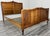 This Vintage French Louis double bed frame showcases elegant proportions, flowing curves, and finely carved detailing,...
