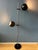 Classic mid century floor lamp with two black eyeball shades. The two metal shades can be turned in any direction. They...