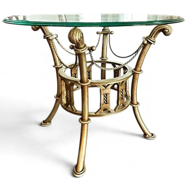 Elevate Your Space with Timeless Grandeur of Maitland-Smith Mid-Century Neoclassical Gilt Side Tables Make a breathtaking...