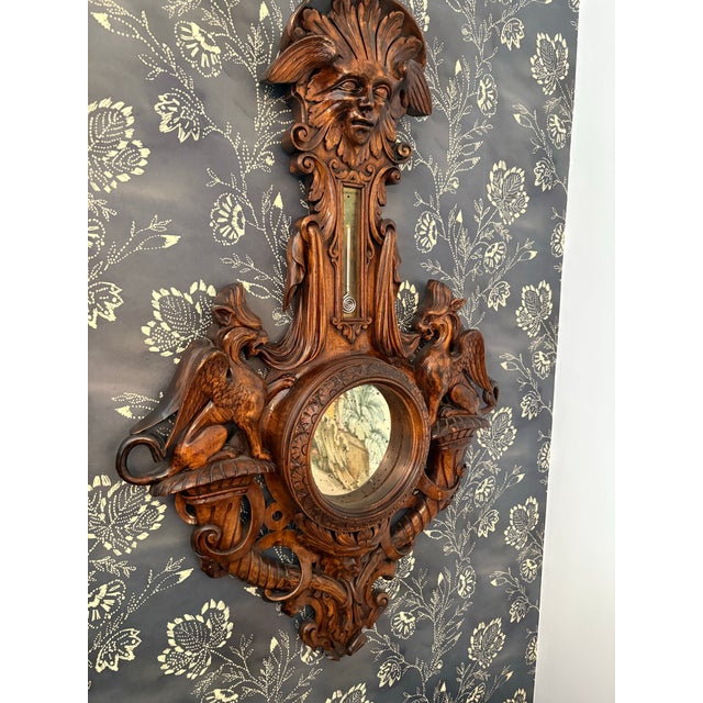 Gorgeous walnut mirror carved in the Black Forrest style. From the 19th century, possibly earlier, with original round...