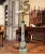 This antique French Directoire-style table lamp features distinctive hand-painted Napoleonic military scenes and a...