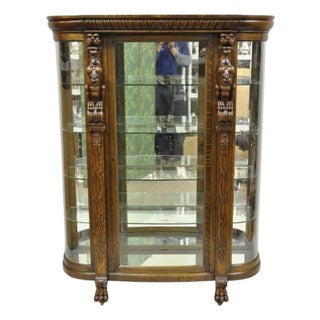 Antique American Empire Tiger Oak Curved Glass China Cabinet W/ Carved Griffins For Sale