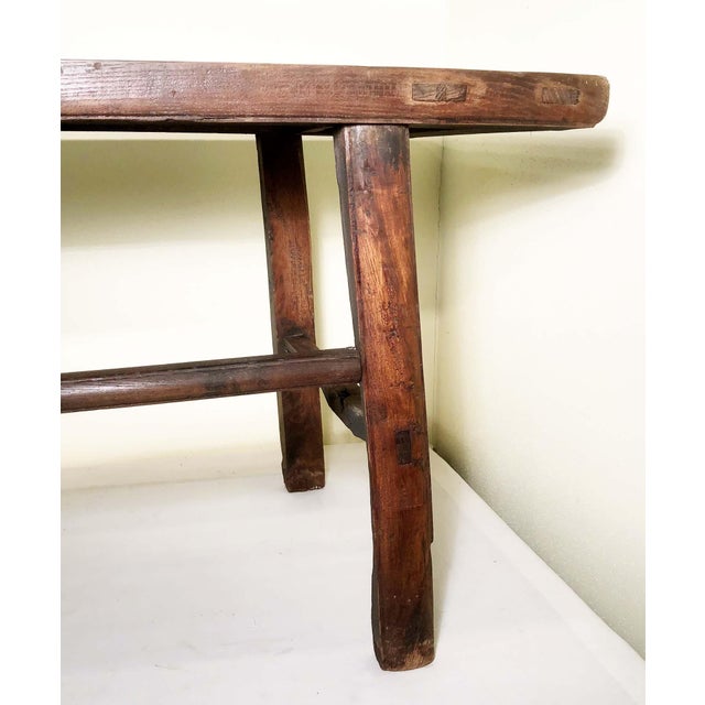 This antique Chinese table was is hand crafted in elegant Ming style with simple and straight lines. The table is...