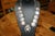 An early piece of Kirk Smith's work and it is/was rare to find a squash style necklace by him. This is signed with his...