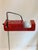 “Spider” floor lamp by Joe Colombo, model no. 3319, in red for Oluce. Crafted from red metal and chrome, it is one of the...