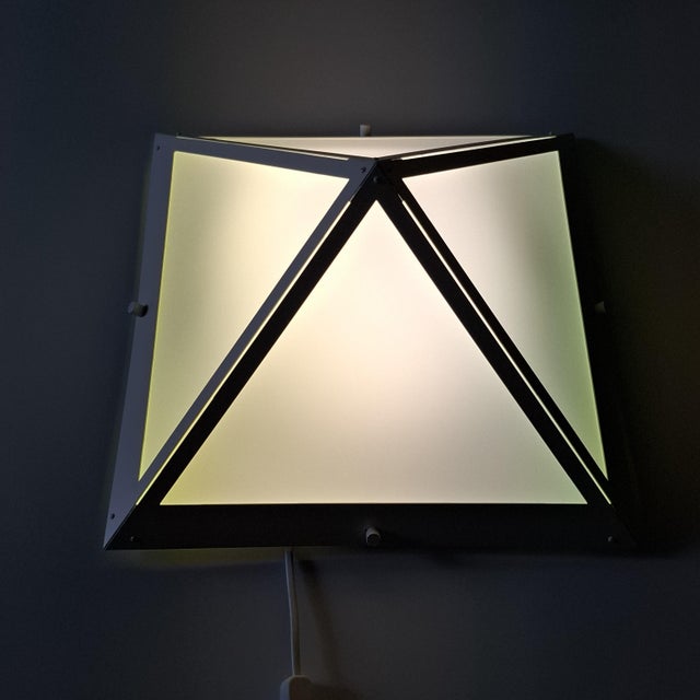 Original geometric design lamp from the renowned German manufacturer Glashütte Limburg, model 3898. The exceptional square...