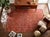 A vintage handwoven Maimana kilim from northern Afghanistan, overdyed in a deep coral rust. Maimana, in Faryab province,...