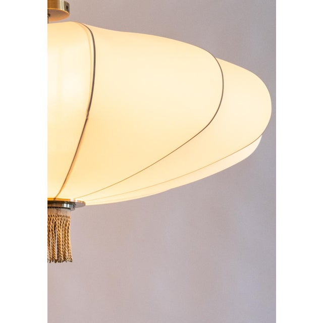 Dark Oxidized Brass and Sculptural Stretch Fabric Pendant Light by ZAVADSKI, in New conditions. Designed from 2000 Up to...