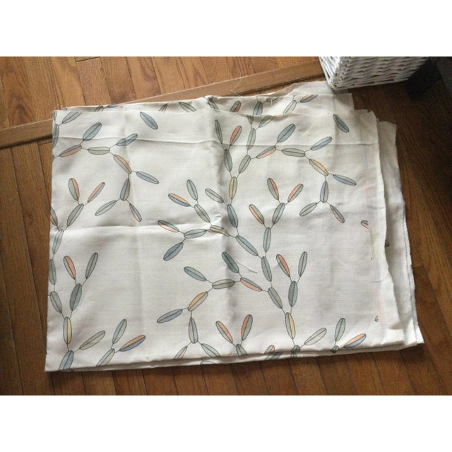 GREAT PIECE RADISH MOON linen designer ecru variegated fabric with printed leaves on it. The leaves are blue green and...