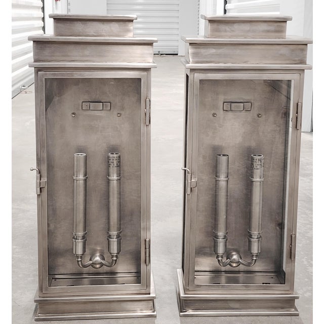 Pair of Chapman & Myers Linear tall lantern sconces in a polished nickel finish. The lantern features two 60 watts...