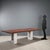 Dining or office table with a large rectangular top in burl veneer and walnut band, and architecturally shaped white...