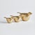 This trio of modern bird sculptures is made of cast aluminum and finished in a warm gold. A charming accent for ottoman,...