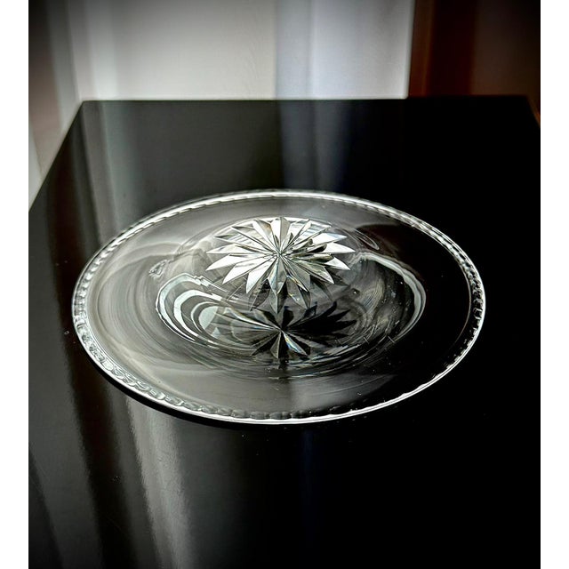 Beautiful set of five signed Webb Corbett cut glass dessert plates with precision star-cut bases and faceted rims. A...