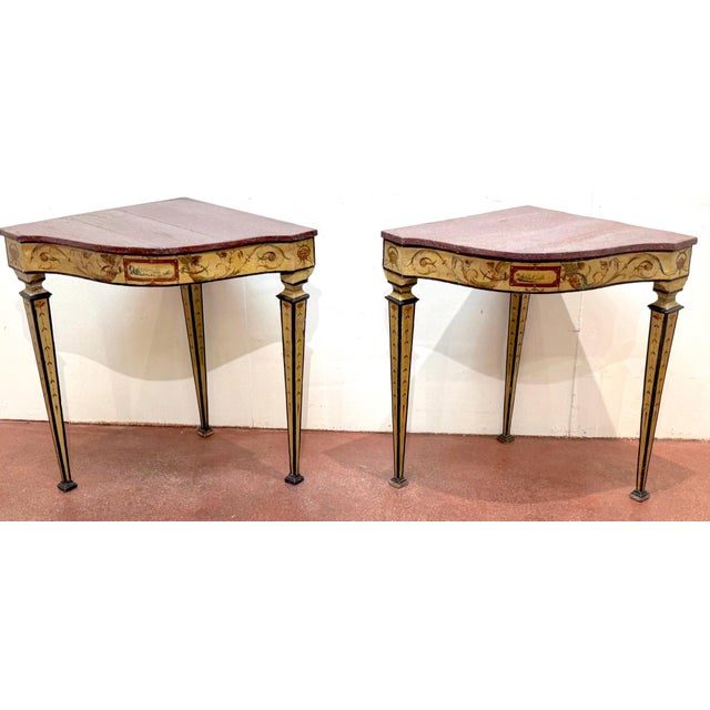 Pair of 18th-Century Neapolitan Painted Corner Console Tables with Faux Porphyry Tops Naples, Italy, circa 1760–1785 This...