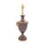 A neoclassical urn-form table lamp featuring ram’s head mounts, rich oxblood textured enamel, and brass accents. Its...
