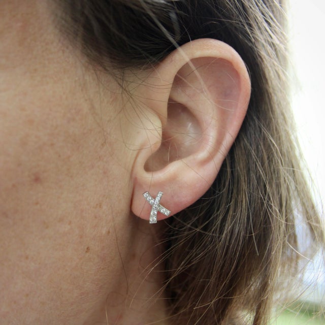 These are a classic and fun pair of kiss earrings from Paloma Picasso for Tiffany & Co. The earrings are platinum and...