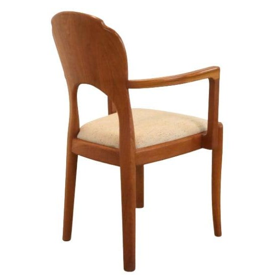 Beautiful designer chair from Denmark. This teak chair with beautiful original light-colored upholstery is a real feast...