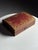 Red leather jewelry box. Originally from France, mid-20th century. Dimensions: 30L x 22D x 9.5H