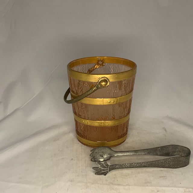Cambridge Glass Co. pink glass Ice Bucket with Tongs for your consideration. The ice bucket measures approx. 6 inches tall...