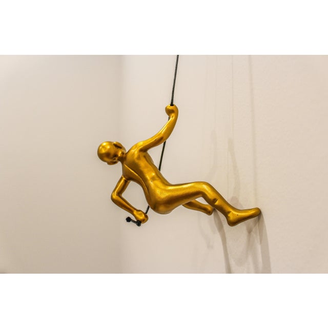 Our luxurious Gold Climbing Man is a beautiful addition to your wall decor! Curate your own collection with our variety of...