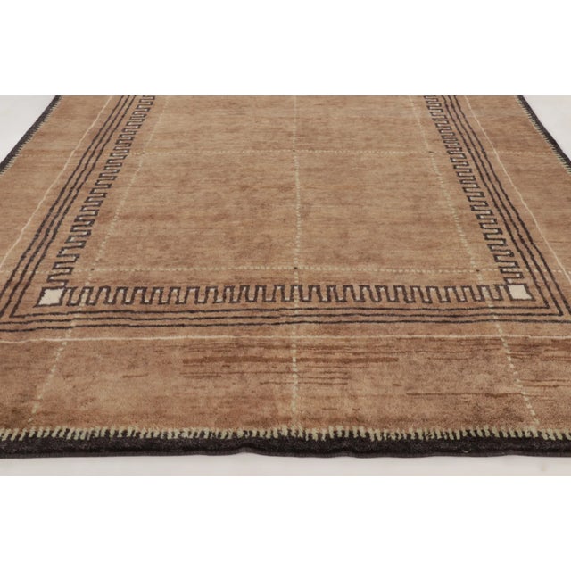 Hand-knotted in premium wool, this contemporary 9x12 rug joins Rug & Kilim’s Art Deco collection. Drawing subtle...