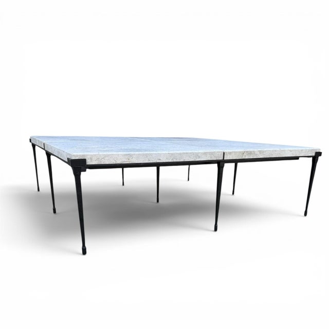 A striking coffee table from iconic designer Holly Hunt. The Rue de Seine table is comprised of four Bruges beige honed...