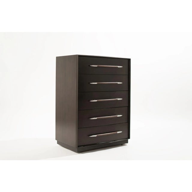 One of T.H. Robsjohn-Gibbings classics, designed for The Widdicomb Furniture Company, circa 1950-1950. This walnut chest...