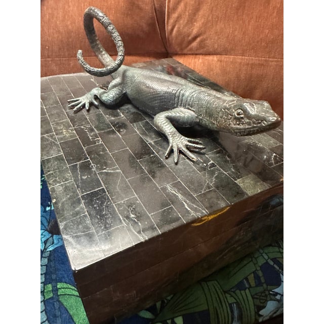 This is a vintage Maitland-Smith Tessellated Stone Box which features a Bronze Lizard Handle. "A highly coveted,...