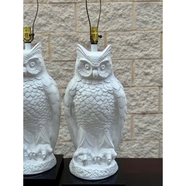 Pair of oversized vintage ceramic owl table lamps, each featuring a highly detailed sculptural body with layered...