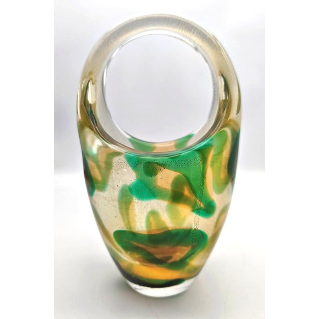 This exceptional mid-century modern glass vase was designed and executed by the legendary master glassmaker Archimede...