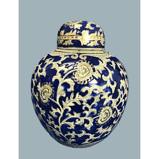 Midnight Bloom Ginger Jar with Lid – 13” The blue and gold swirl design is a traditional Chinese style that is both unique...