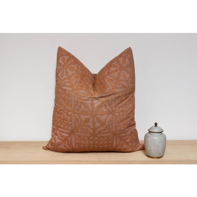 This vibrant decorative pillow cover features beautiful array of patterns, with hand crafted appliqué cut work, giving it...