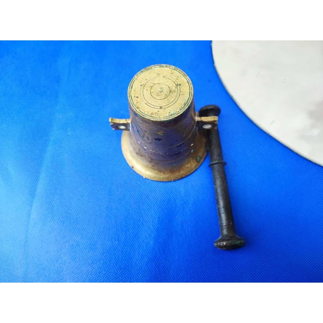 Pre-war bronze mortar, dimensions: mortar height 8.3 cm. diameter - 8.3 cm. total height with hammer - 12 cm.