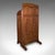 This is a large vintage dressing screen. An Oriental, mahogany folding privacy screen or room divider, dating to the late...