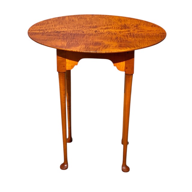 Bay Colony Antiques is proud to offer for sale this wonderful Vintage Eldred Wheeler Tiger Maple Tea Table. Founded in the...