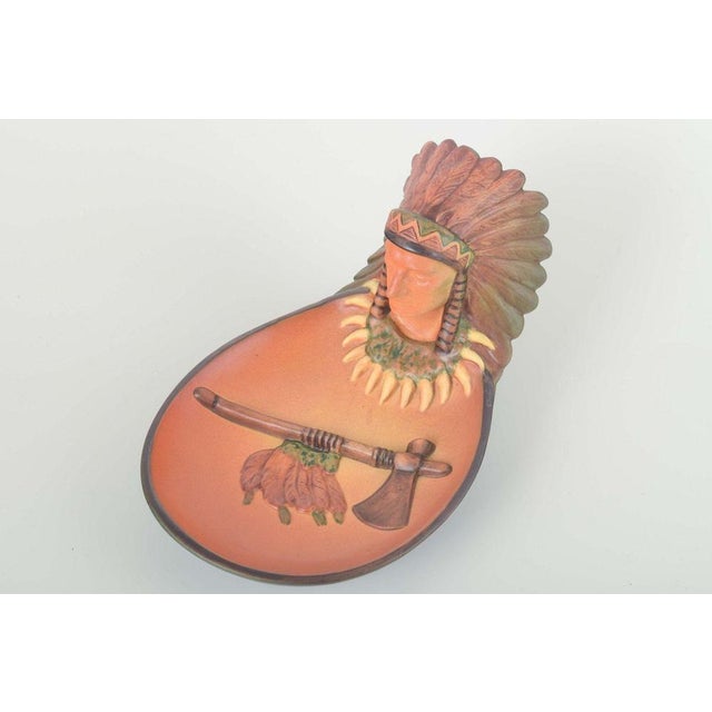 Ipsens Enke Art pottery bowl with Native American head, model 286. Decorative bowl featuring a relief bust of a Native...