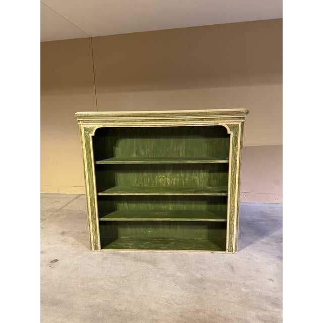 This showstopping 1940s French bibliotheque brings effortless European elegance to any space. The hand-painted finish is a...