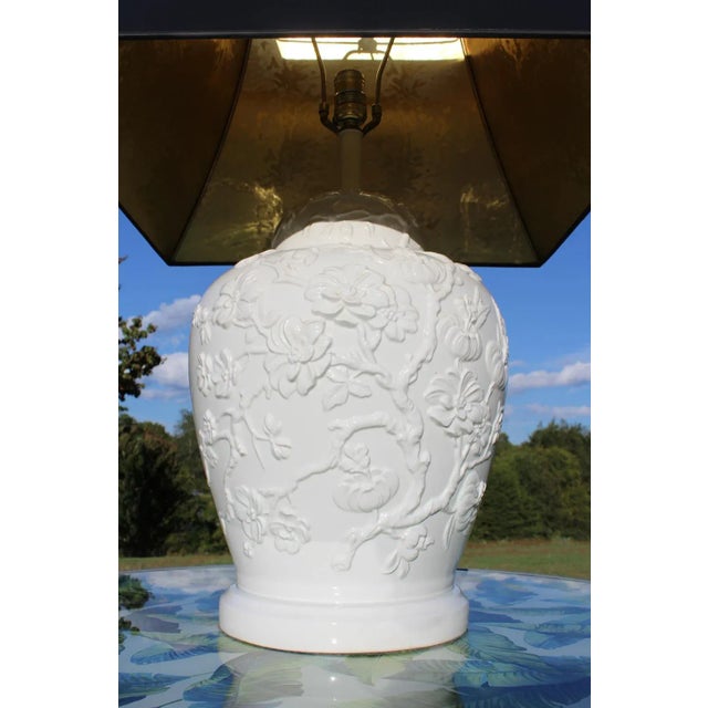 This is a huge lamp, measuring 31" high and 12" wide at the widest point. The diameter of the base is 10". It's sometimes...