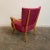 Mid-century modern arm chair attributed to Heywood Wakefield that has been reupholstered in a dark pink fabric. The pink...