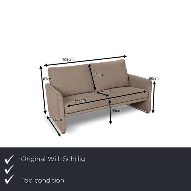The sofa by Willi Schillig is covered in a beige fabric and is characterized by its reduced, simple design. The floor-to-...