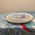 A charming vintage English bone china decorative display plate from the "Seasons of the Year" collection. This cabinet...