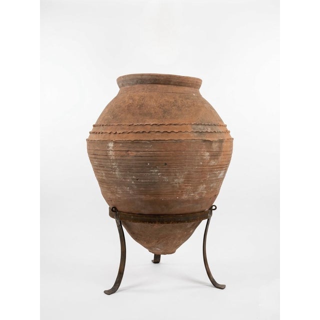 This authentic 1930s Greek terracotta pithos is a striking example of Mediterranean utilitarian artistry. Originally...
