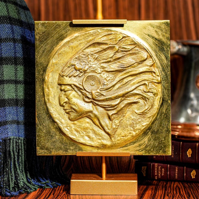 Striking in form and timeless in composition, this solid brass relief plaque embodies both strength and elegance. Crafted...